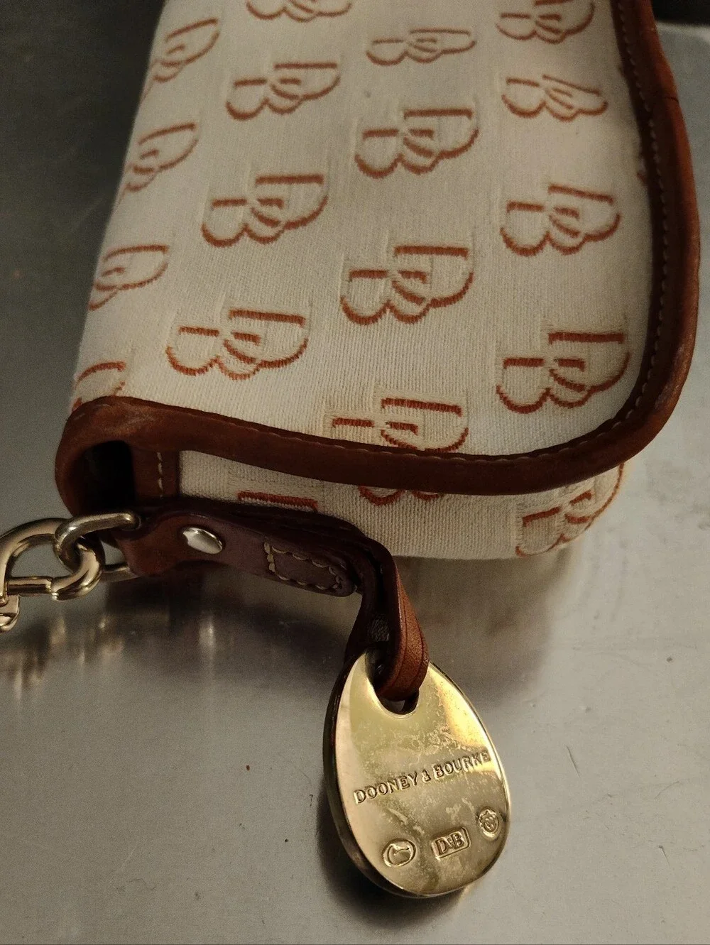 Dooney Bourke Vintage Wristlet Snap Repeating Logo, Cream/Tan